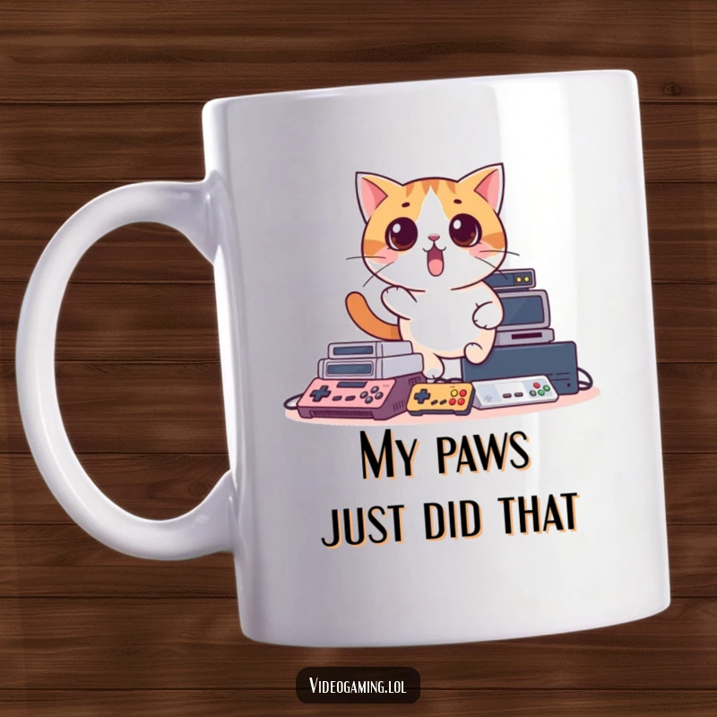 Funny ceramic mug featuring a surprised cat tumbling over scattered video game consoles, expressing gamer frustration humorously.