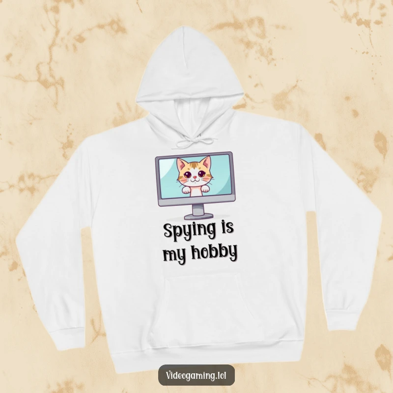 Funny hoodie with a curious cat peeking from behind a large monitor, offering warm and hilarious comfort.