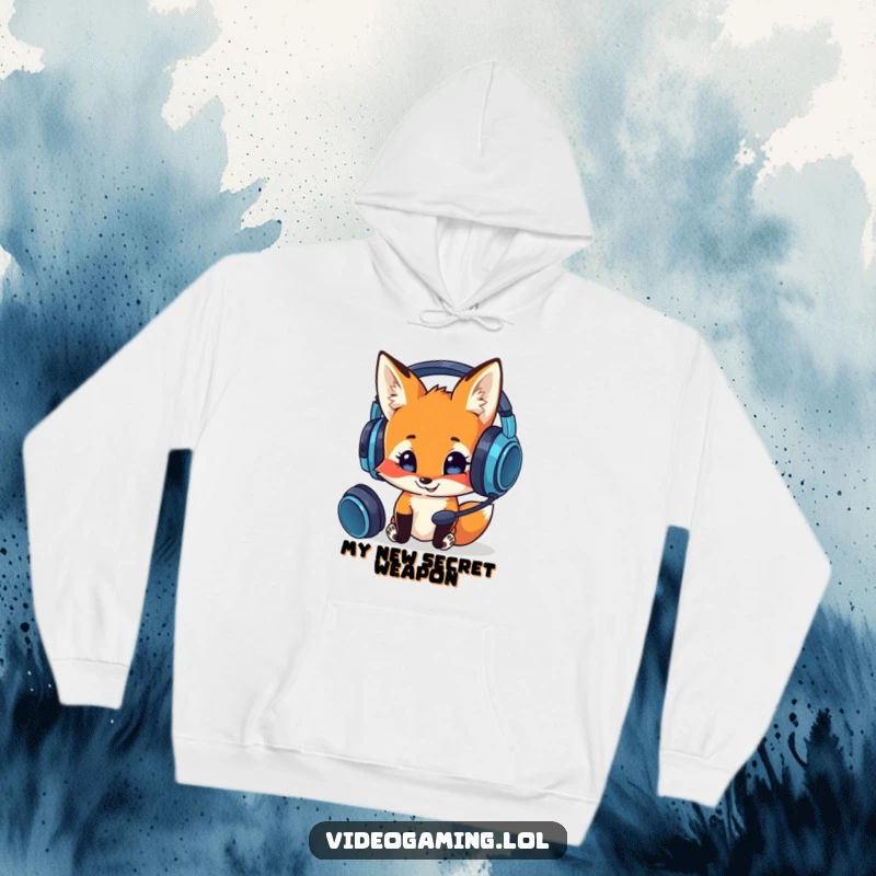 Funny hoodie showcasing a curious fox smiling while looking at a complex gaming headset, perfect for a humorous gamer's cozy setup.