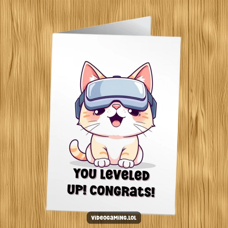Funny Free Printable Congrats Card: Smiling cat in VR headset, celebrating a virtual world victory, ready to cheer.