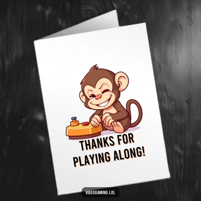 Funny Free Printable Thank You Card: Mischievous monkey giving a game-controller-shaped thank you with a cheeky grin.