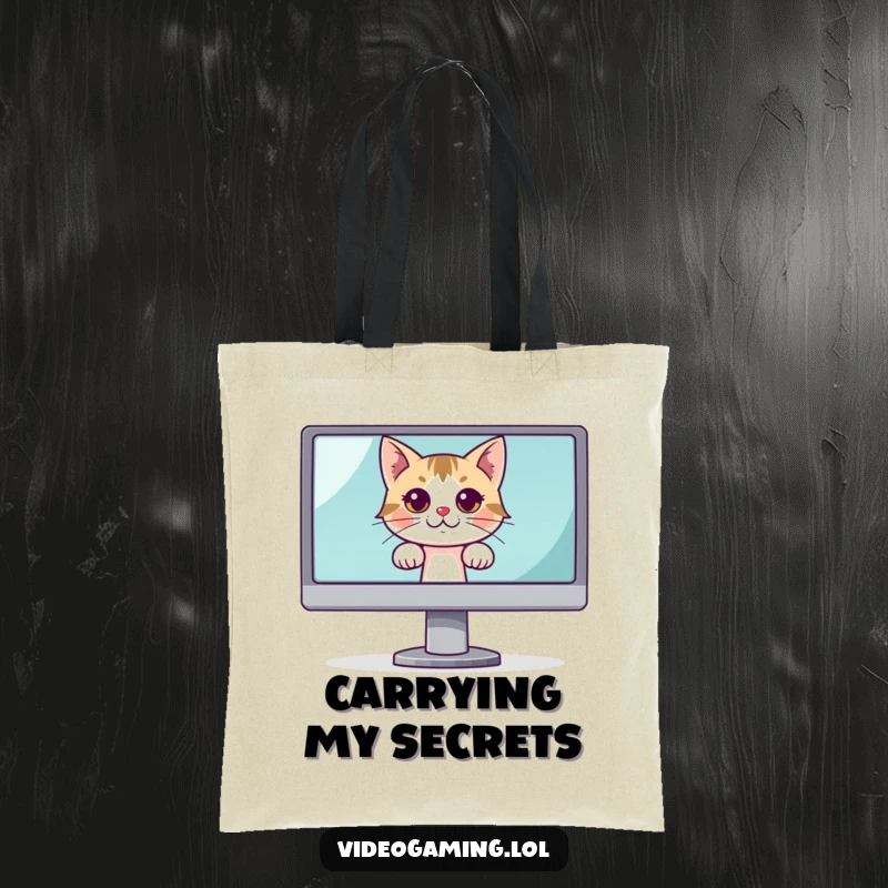 Funny tote bag with a curious cat peeking from behind a large monitor, perfect for carrying essentials humorously.