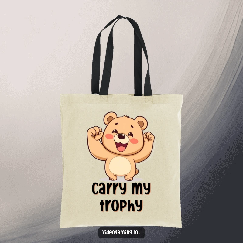 Funny tote bag illustration of a happy bear pumping its fist in the air, celebrating a great success.